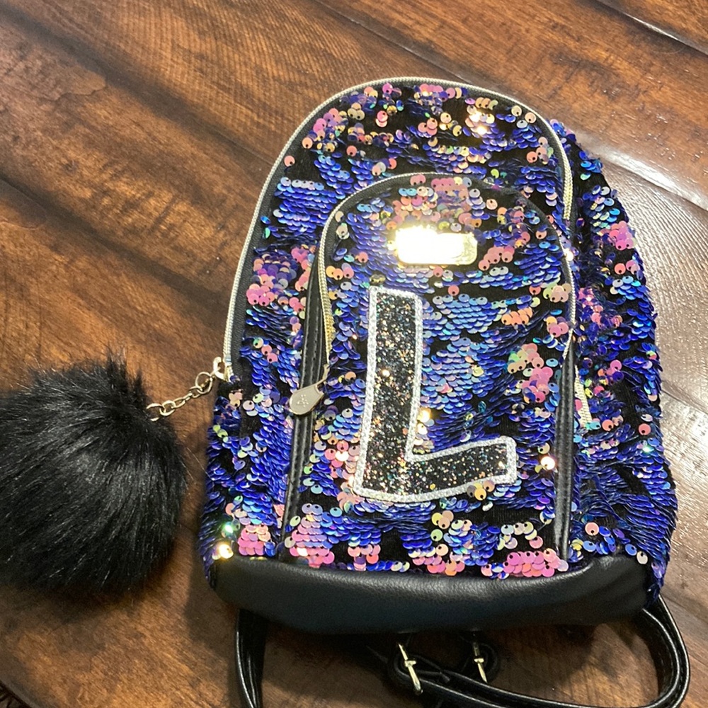 Justice squib mini backpack letter L